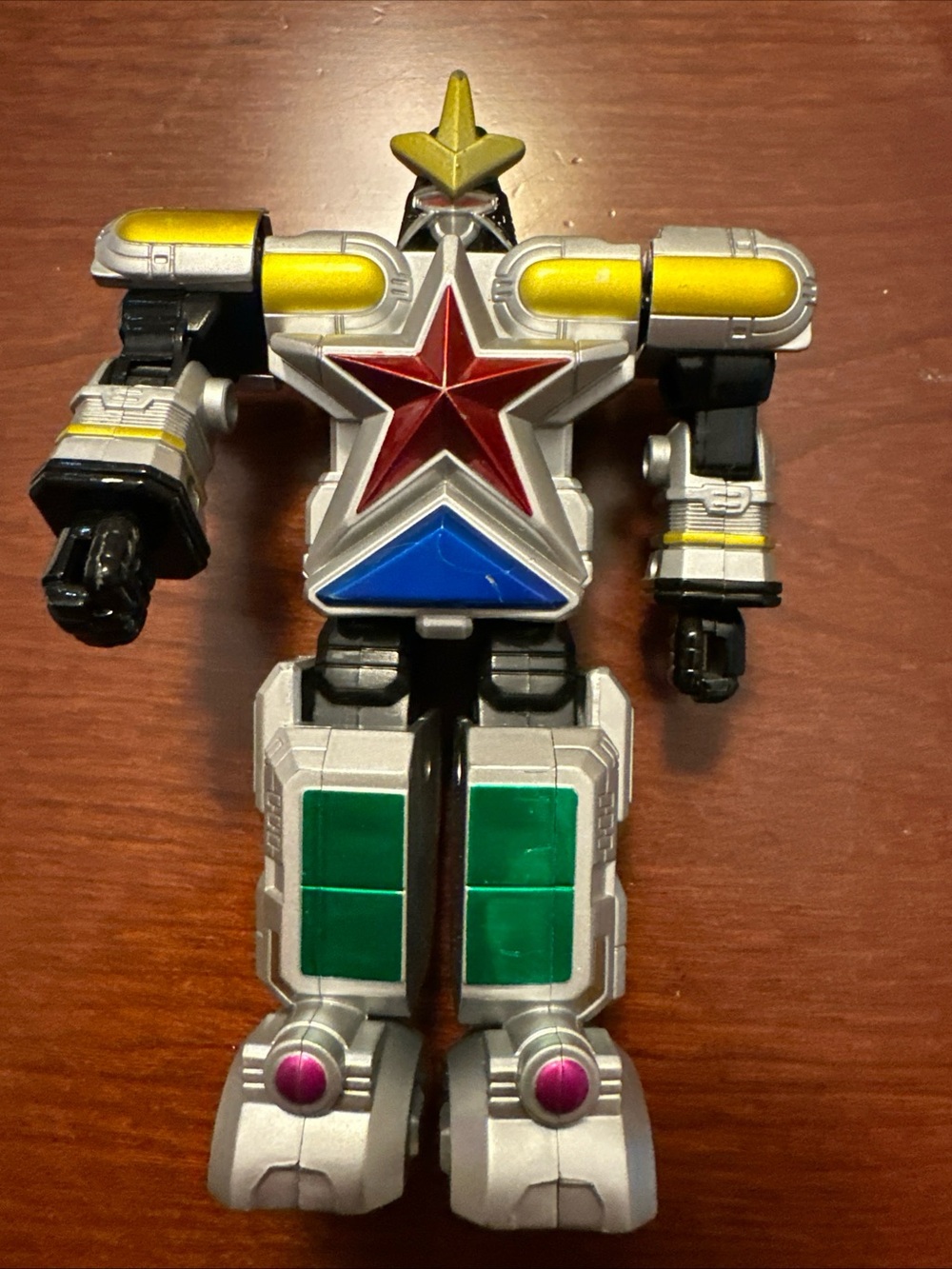Silver Star Robot Action Figure with Red, Blue, Green & Yellow Accents